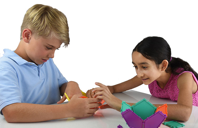 two children using geometiles